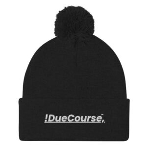 “Black DueCourse beanie with a pom on top, featuring embroidered !DueCourse(TM) logo”